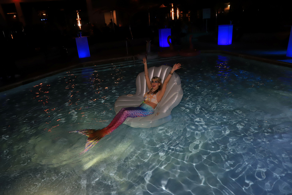 mermaid at the namm show pro audio pool party